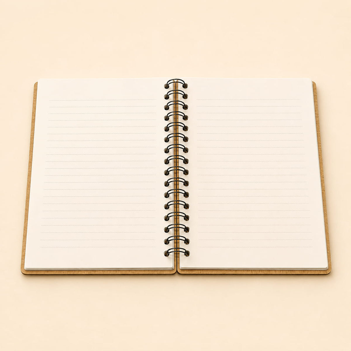 An open spiral-bound notebook with lined pages, shown from above on a warm beige background.